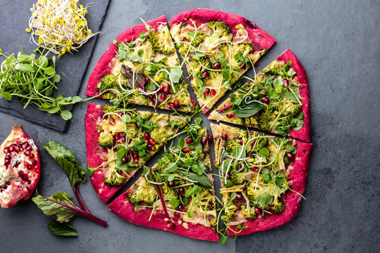 Vegetable bases and raw vegan toppings can be delicious, but they're not the only pizzas vegans can eat! Photo © Iblinova via Adobe Stock