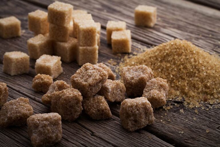 While raw cane sugar varieties are a little less processed, regular brown sugar is very similar in composition to white sugar. Photo © igorp17 via Adobe Stock