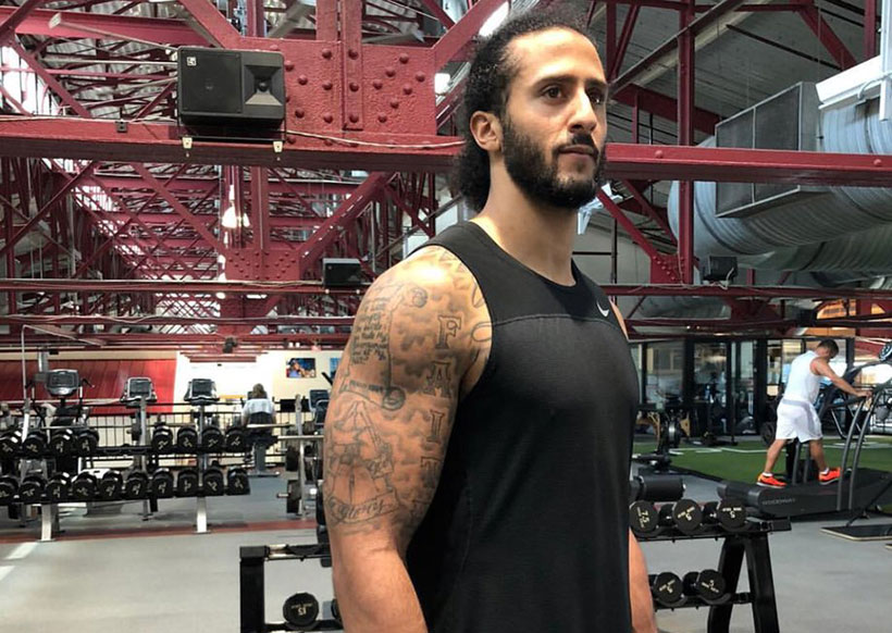 Vegan athlete Colin Kaepernick working out at the gym 