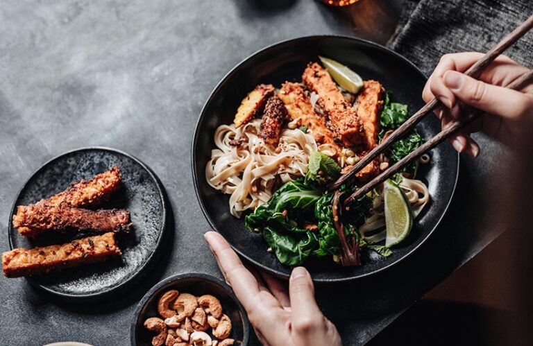 Marinating tempeh is a delicious way to get the benefits of fermented foods into your meals. Photo © alvarez via Getty Images