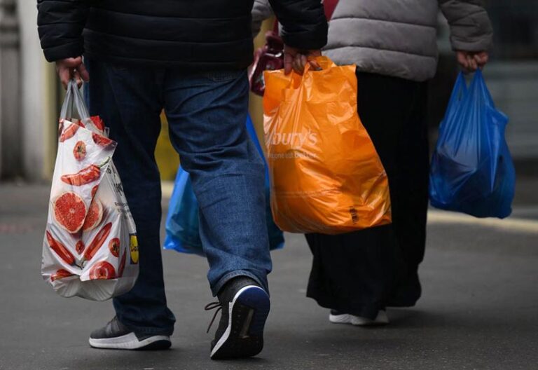 We all have the 'stash of shame' at home. Forget being fashionable and make use of the bags you've already got. Photo © DANIEL LEAL / Contributor Getty Images