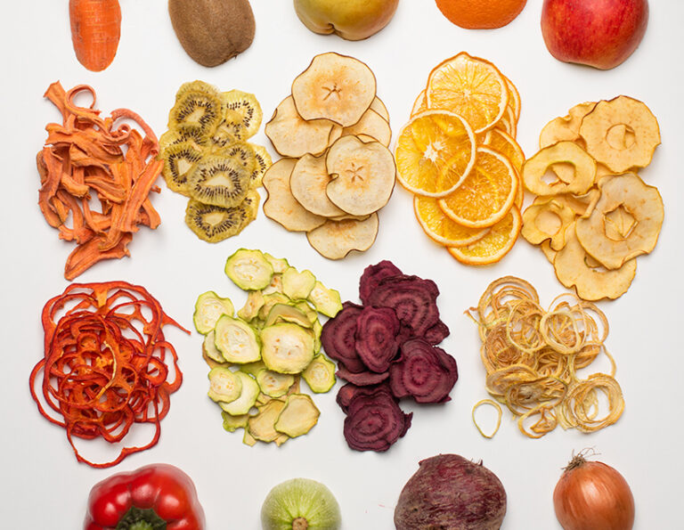 Thinly sliced summer produce can be dehydrated to make a satisfying sweet or salty snack. Photo © oksix via Adobe Stock