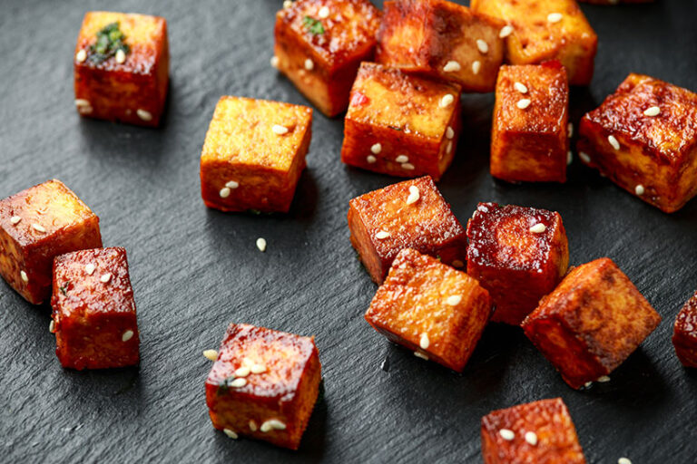 Tofu fried at too low a temperature will absorb the oil and be soggy rather than crisp, so make sure your pan is nice and hot. Photo © 