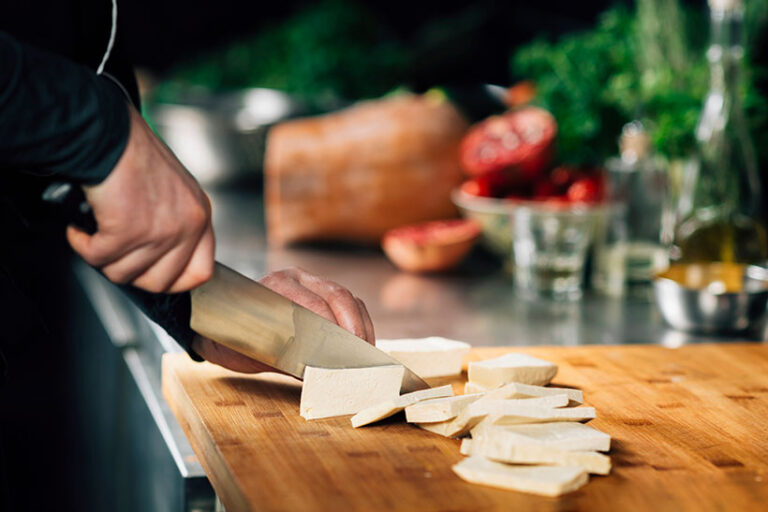 Only firm tofu needs prepping to remove excess water, and you do this by pressing it under something heavy for around 15 minutes before cooking. Alternatively, you can use a tofu press. Photo © Stevica Mrdja / EyeEm via Getty Images