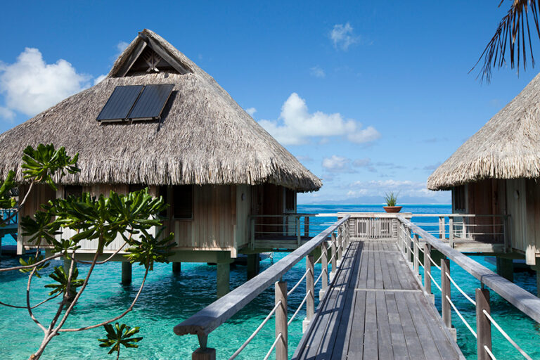 Look out for accommodation which utilises eco-friendly features like solar panels. Image © Konstik via Getty Images