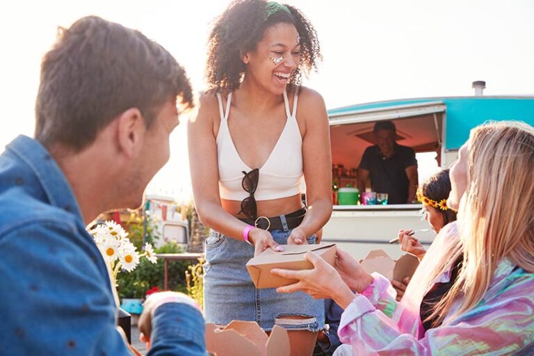 Vegan festivals and events can be a great place to meet like-minded friends. Photo © Monkey Business via Adobe Stock