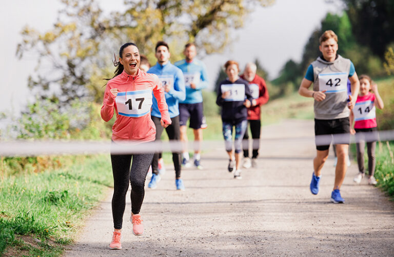 A charity run is just one of the ways to raise funds for animals. There are plenty of options that will fit with your lifestyle. Photo © Halfpoint via Adobe Stock