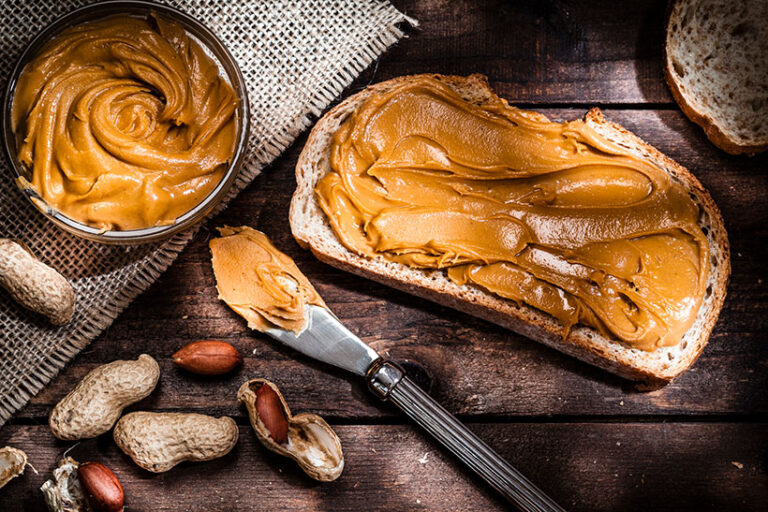 Peanut butter made with 100% whole nuts are the best for your health. Photo © fcafotodigital via Getty Images