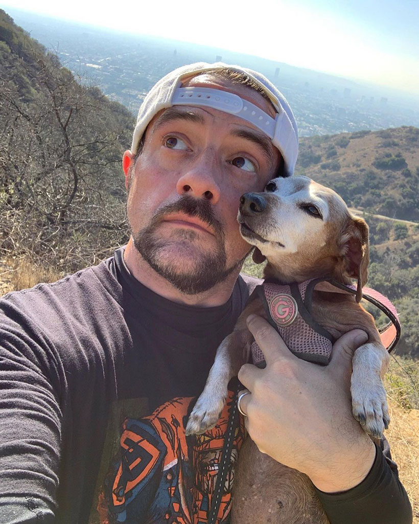 Kevin Smith takes a hike with his pet dog 