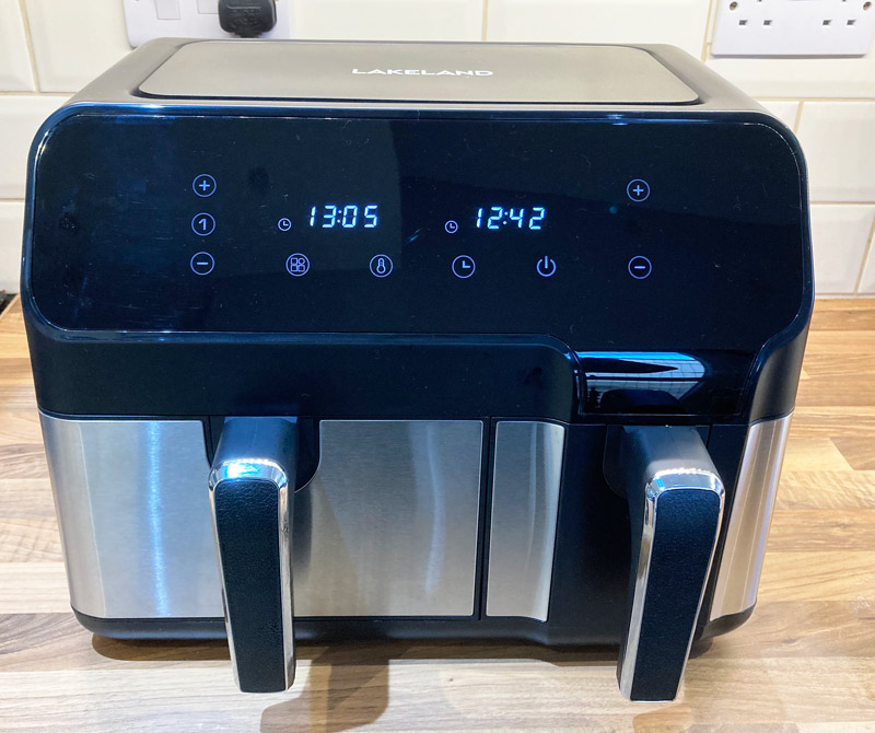 Lakeland-Dual-Basket-Air-Fryer-out-on-a-kitchen-worktop-with-two-timers-going