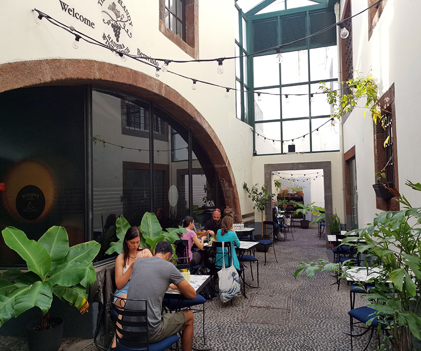 Outdoor seating area at Fala Fala cafe and restaurant in Madeira