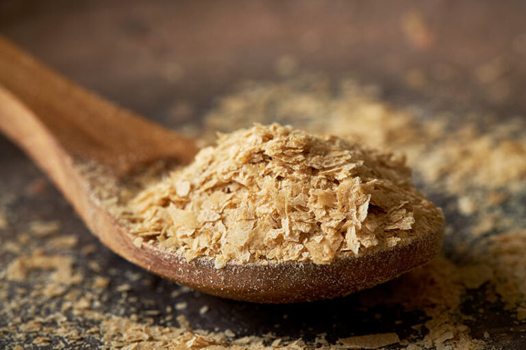 Nutritional yeast is one of the most popular b vitamin sources for vegans. Photo © Nedim_B via Getty Images