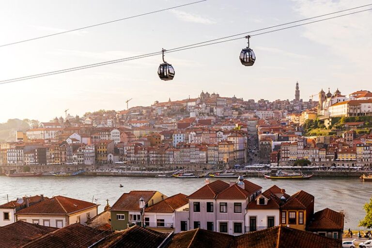 Porto is a coastal city in northwest Portugal with a thriving food scene waiting to be discovered down its historic cobbled streets. Photo © Alexander Spatari via Getty Images