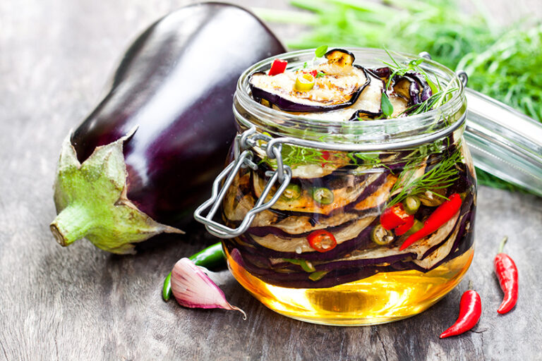 Tender, grilled vegetables preserved in olive oil make great additions to sandwiches and salads, and will keep for up to 6 months. Photo © lena_zajchikova via Adobe Stock