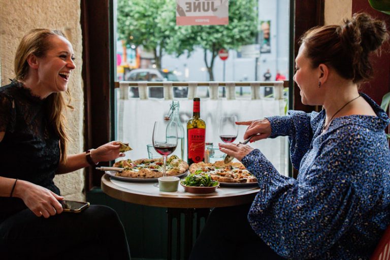 It's great to catch up over a vegan slice of Purezza pizza. Image via Purezza Manchester.