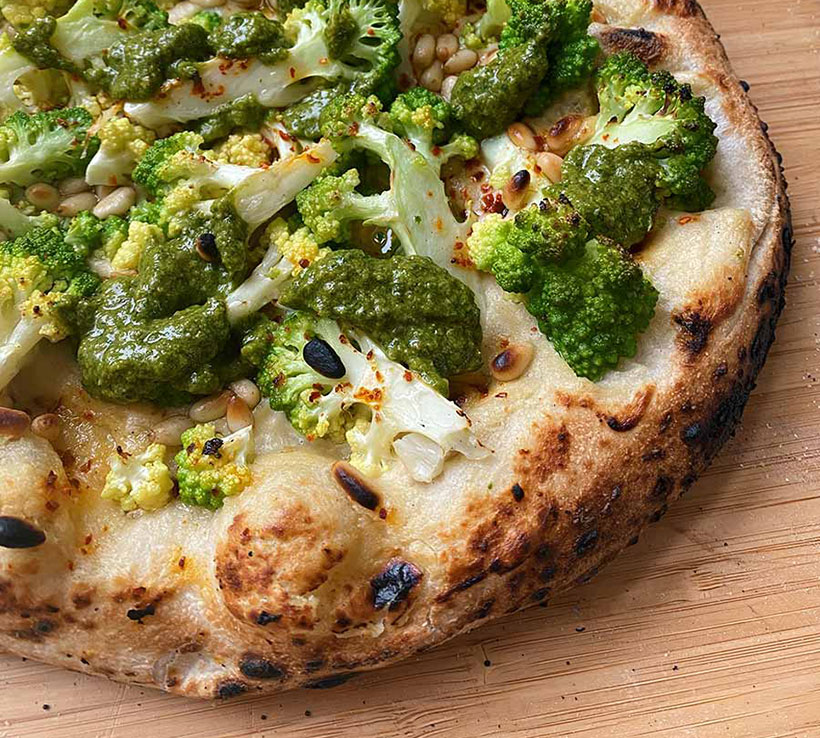 Vegan Romanesco Pizza with Cashew Cream, Salsa Verde and Pine Nuts