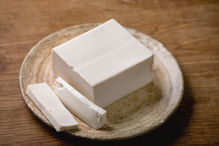 Silken tofu has a soft texture that make it the perfect base for creamy desserts like cheesecakes. Photo © Natasha Breen via Getty Images