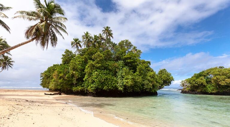 Vavau is more popular with Samoan families, and has more basic fales and no food, so bring a picnic and enjoy the swirling black and white sand and volcanic rock formations. Photo © samvaltenbergs via Getty Images