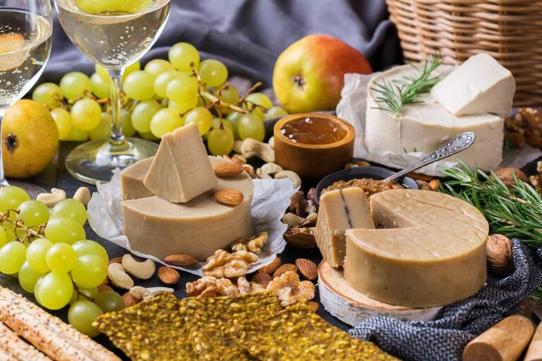 Plant-based cheeses are processed, but artisan brands tend to contain more natural ingredients made with healthier processes. Photo © Aamulya via Getty Images