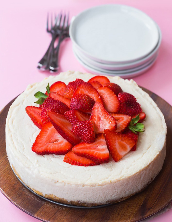 Vegan cheesecake topped with strawberries