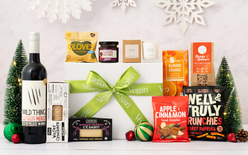 Vegan-Christmas-cheese-and-wine-hamper-with-products-laid-out-on-the-table