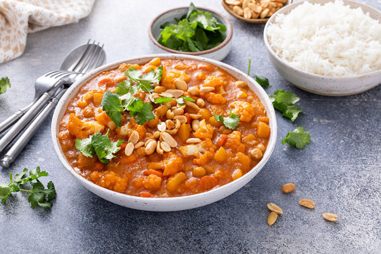 Peanuts can add crunch and a protein punch to curries and stews. Photo © VeselovaElena via Getty Images