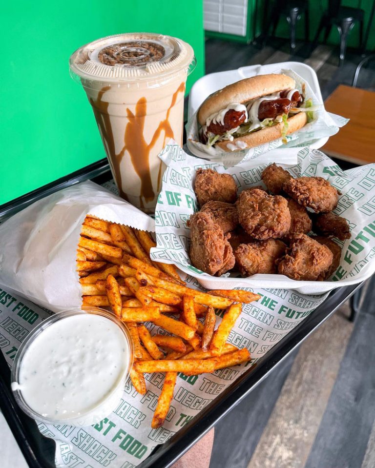 A tasty vegan selection of burgers, nuggets, chips and dip from the Vegan Shack in Manchester. Image via Facebook.