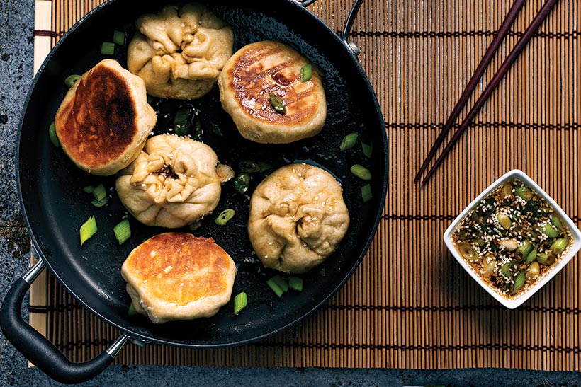 step 10 - vegan steamed bao buns browned in the pan