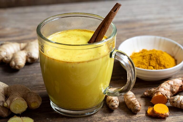 Turmeric is delicious in cooking and in hot drinks like this ginger and turmeric soya latte. Photo © Sarah Biesinger via Getty Images