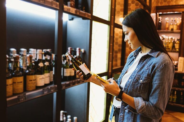 While some manufacturers have started clearly labelling their wines as vegan, many still don't. You can use apps like Barnviore to check if your bottle is. Photo © progressman via Adobe Stock